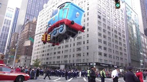 Thomas the Train balloon going through intersection in 2015 Macys Parade 4k Stock Footage 57829217