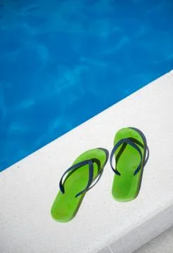 Thongs by the pool Stock Photos
