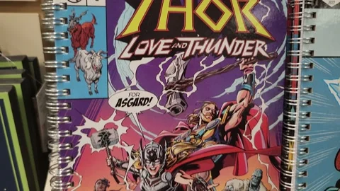 Thor Love and Thunder Craft Book Comic Stock Footage 218402707