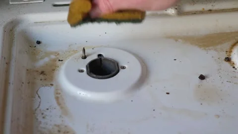  Thorough Cleaning: Detailing Progress on a Gas Stove Stock Footage 305067274