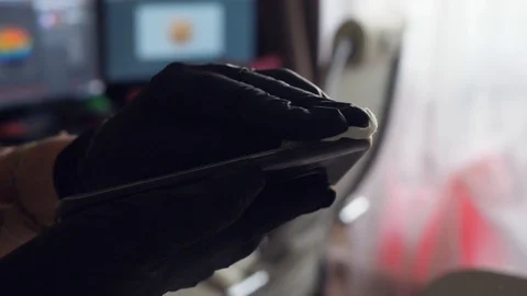 Thoroughly wipe your smartphone with a black glove sanitizer. HD, 1920x1080 Stock Footage 127191653