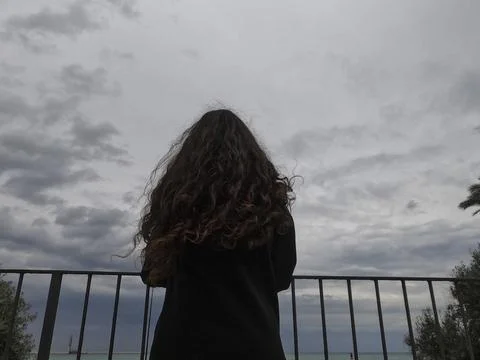 Thought looking at the cloudy sky Stock Photos