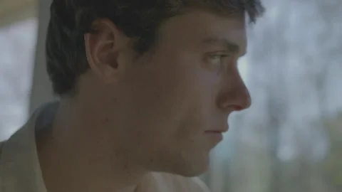 Thought Man Looks Out Window Stock Footage 208784407
