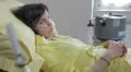 thoughtful and depressed woman in a hospital bed for a serious illness HD Footage