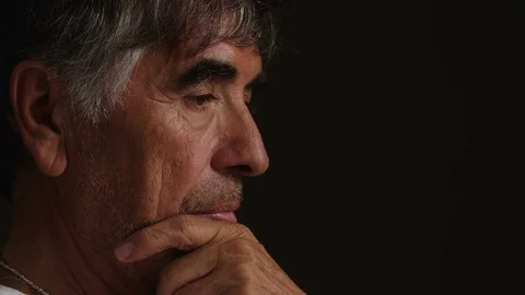 Thoughtful and worried mature man's profile Stock Footage