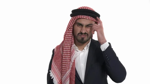 Thoughtful Arab man touching his forehead temples while thinking. Think about it Stock Footage 125828983
