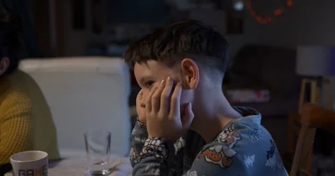 A thoughtful boy analyses the suspect. Stock Footage 326875113