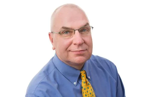 Thoughtful businessman looking at the camera Stock Photos