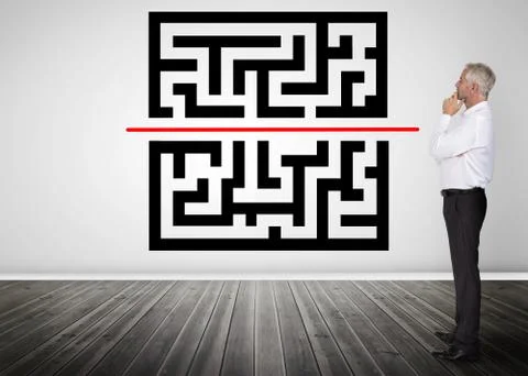 Thoughtful businessman looking at qr code 写真素材