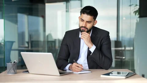 Thoughtful businessman thinking about solving a problem while working Stock Footage 318217272