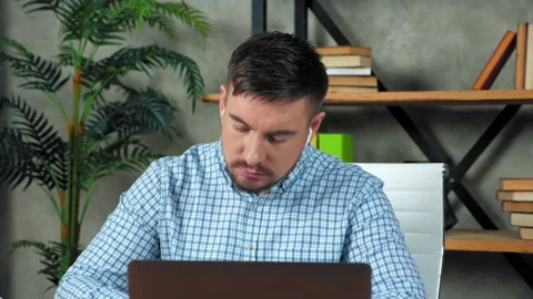 Thoughtful businessman writes in notebook thinks solution problem performance Stock Footage 148091714