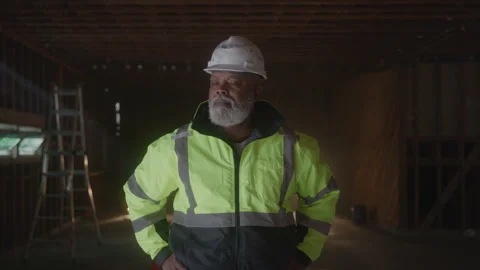 Thoughtful Construction Guy Standing Stock Footage 270389008