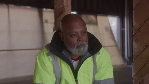 Thoughtful Construction Man Sits On Break At Work Stock Footage 270391464