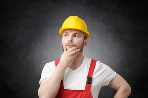 Thoughtful construction worker Stock Photos