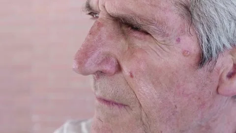 Thoughtful elderly man in profile, deep in reflection Stock Footage 285853243