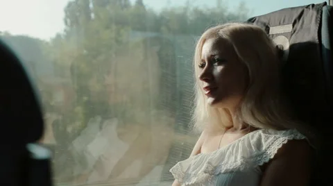Thoughtful girl riding on a train Stock Footage 59798311