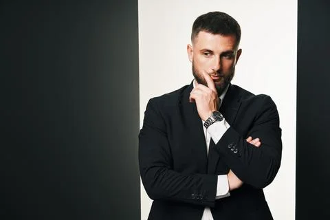 Thoughtful handsome man posing in studio Foto stock