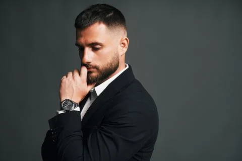 Thoughtful handsome man posing in studio Foto stock
