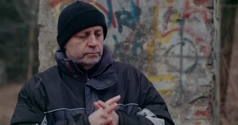 Thoughtful Homeless Man Thinking During War In Winter. Stock Footage 178513761