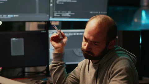 Thoughtful IT engineer brainstorming ideas in office Stock Footage 224579938