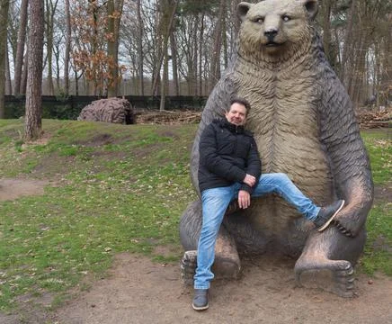 Thoughtful man with bear Stock Photos