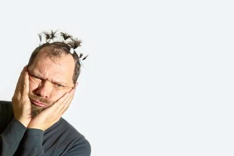 Thoughtful man with a beard, strong human emotions, difficult choice, portrai Stock Photos