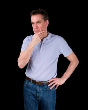 Thoughtful man considering something hand on hip Stock Photos
