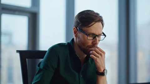 Thoughtful manager creating marketing strategy in light office interior closeup. Stock Footage 340523894