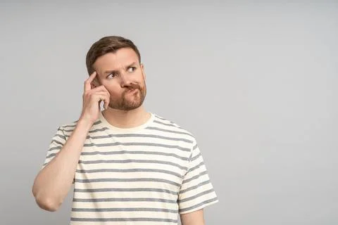 Thoughtful middle-aged man solving problem, planning, thinking of solution Stock Photos