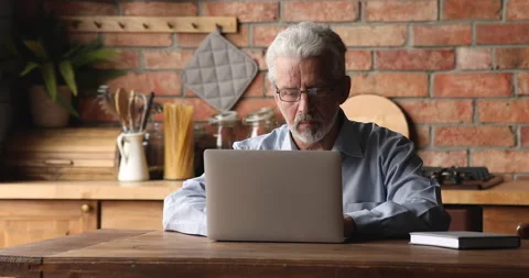 Thoughtful old mature man thinking of problem solution. Video stock 153065114