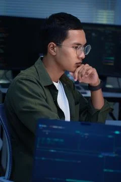 Thoughtful Programmer Developing Digital Technology Stock Photos