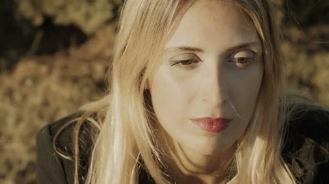 Thoughtful woman deep in her problems: sitting alone and sad Stock Footage 43293463