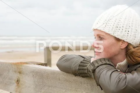 Thoughtful Woman By The Sea