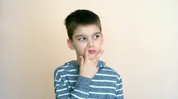 Thoughtful young boy Stock Footage 86079215