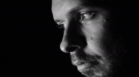 Thoughtful young man looking into the camera: loneliness, sadness, depression Stock Footage 41776096