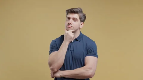 Thoughtful young man looking upward while searching for answer. Decision making, Stock Footage 340422861