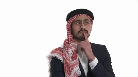 Thoughtful young man touching his chin and forehead temples while thinking. Stock Footage 125827140