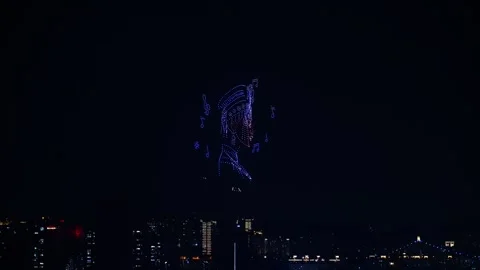 A thousand drones performed a nighttime show in the city featuring images of Zhu Stock Footage 334299495