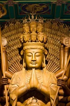 Thousand hands of god image make of wood carving chinese art in Stock Photos