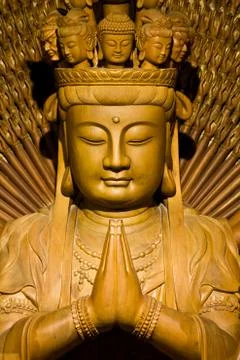 Thousand hands of god image make of wood carving chinese art in Stock Photos