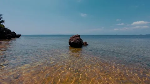 Thousand-Year-Old Ancient Coral Rock in Clear Shallow Ocean Water Stock Footage 337582876