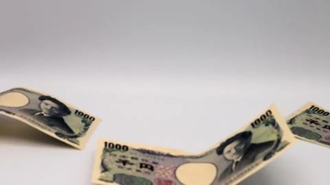 A thousand yen bill falling from above Stock Footage 336513826