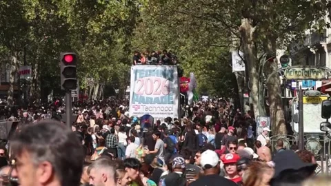 Thousands attend 'Techno Parade' in Paris and protest law restricting 'rave' par Stock Footage 345922736