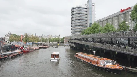 Thousands of bikes at the bike parking space near Amsterdam central station Stock Footage 89729981