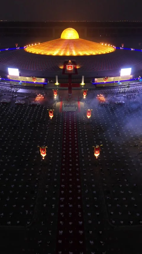 Thousands of Buddhist Monks Meditating During a Night Ceremony in Bangkok, Video stock 335939843