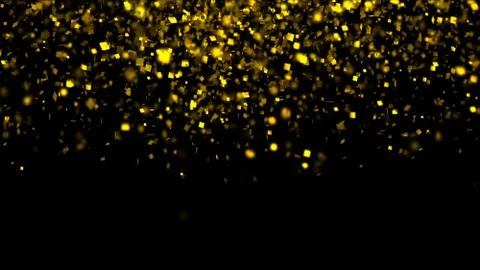 Thousands of confetti fired on air during a festival at night. Stock Photos