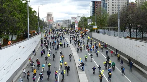 Thousands of cyclists on a city street. Traditional Bicycle parade in Moscow. Stock Footage