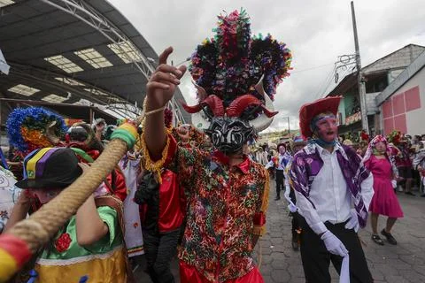 Thousands of devils parade in Diablada Pillarena on the streets of Pillaro in Ec Stock Photos