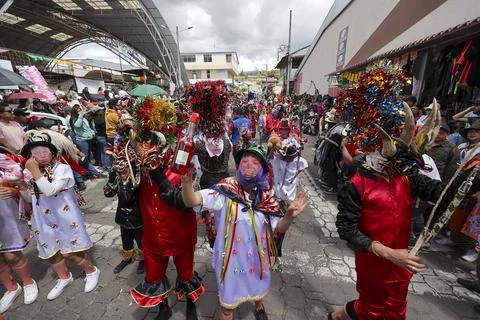 Thousands of devils parade in Diablada Pillarena on the streets of Pillaro in Ec Stock Photos