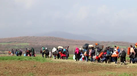 Thousands of immigrants are in a wait at the border between Greece and FYROM  Stock Footage 61198139